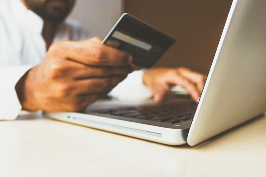 Person selecting cover and payment options online